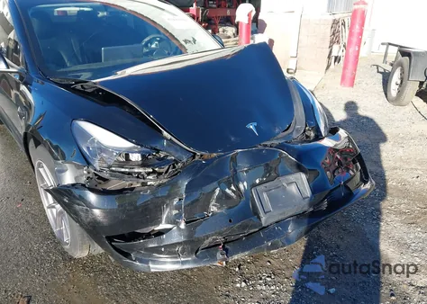 2021 Tesla Model 3 Standard Range Plus Rear-Wheel Drive from USA, damaged, VIN 5YJ3E1EA2MF907099